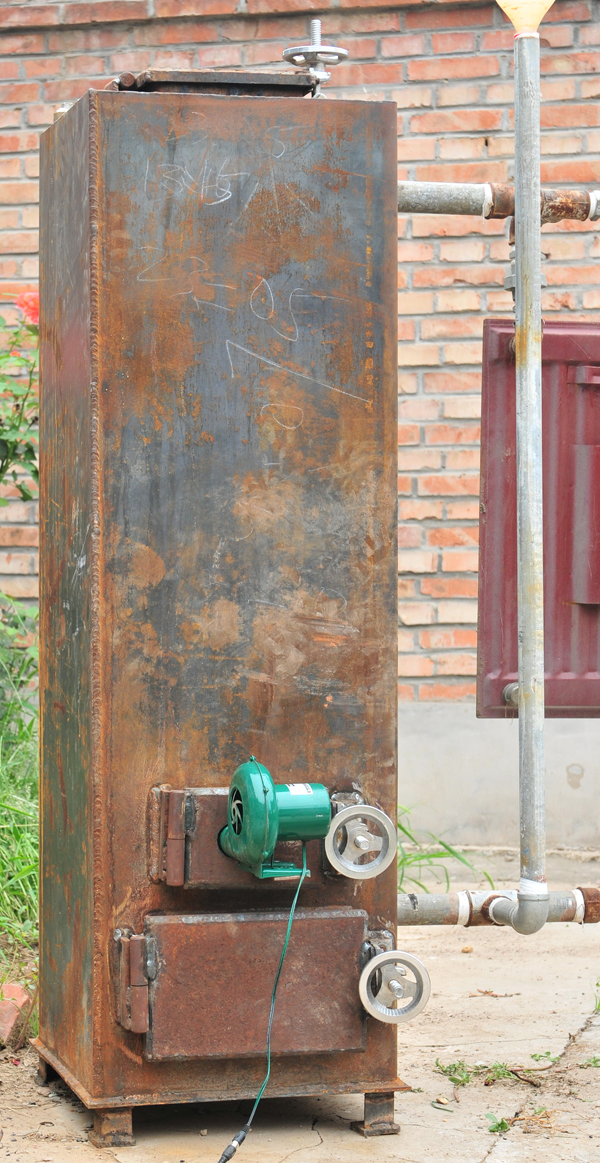 gravity feed or hopper fed wood pellet stove stoker hand fired coal